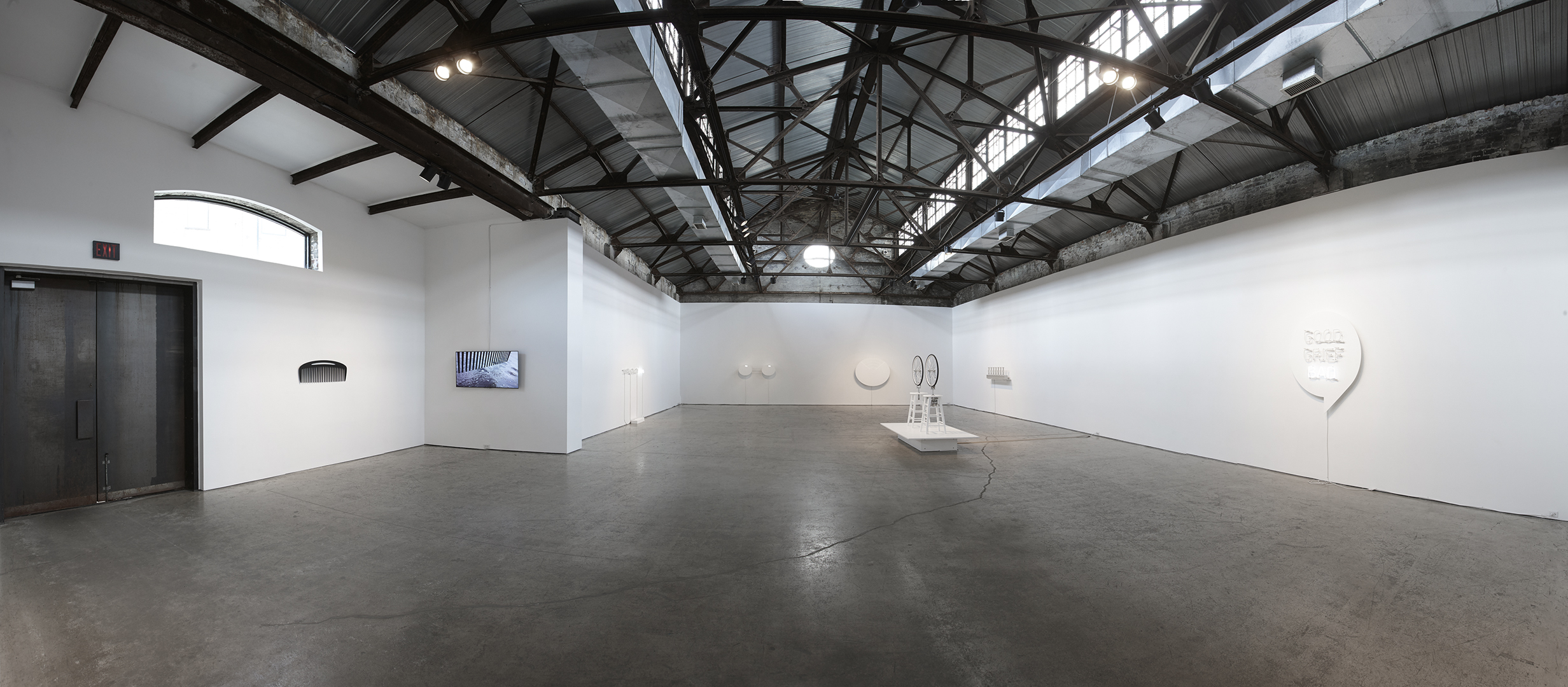 Installation View 1 text, combs wheels & poems 2015